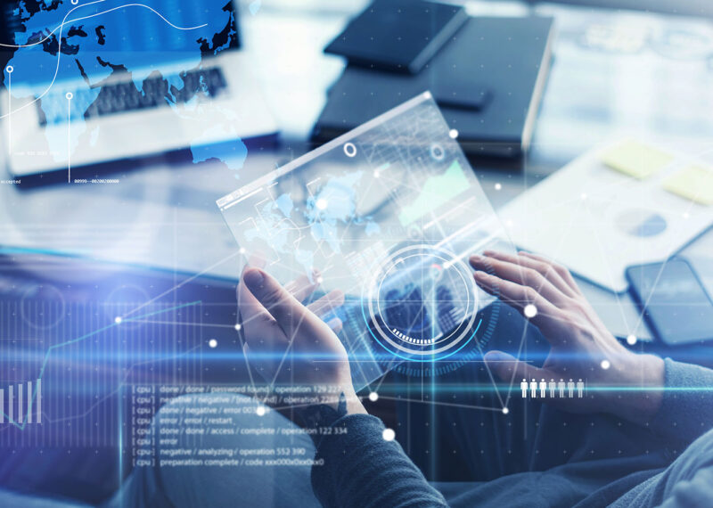 Man with futuristic digital tablet