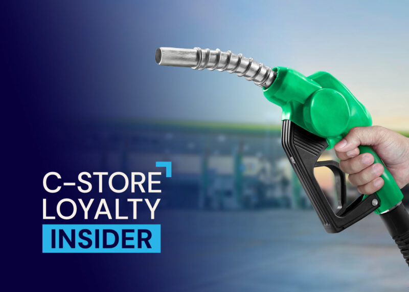 Hand holding green fuel nozzle at gas station with C-Store Loyalty Insider text overlay
