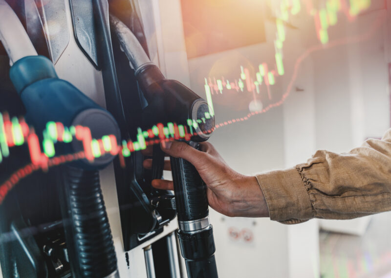 close up of hand grabbing fuel pump