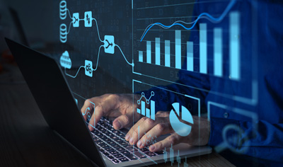 Abstract image of hands resting on laptop keys