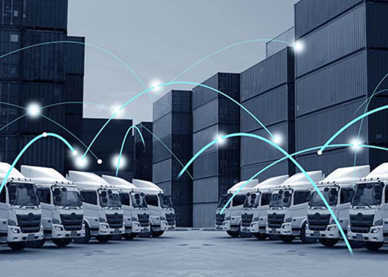Technology linked trucks standing still in cargo storage area
