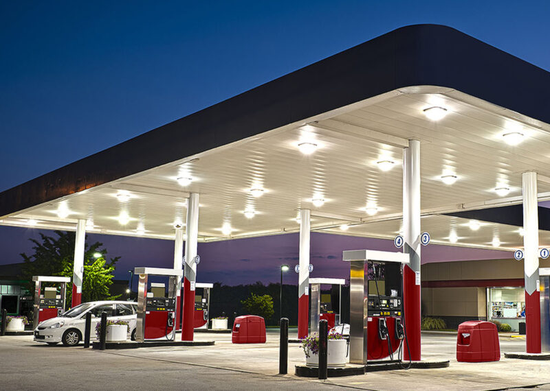 Evening view of gas station fuel pump