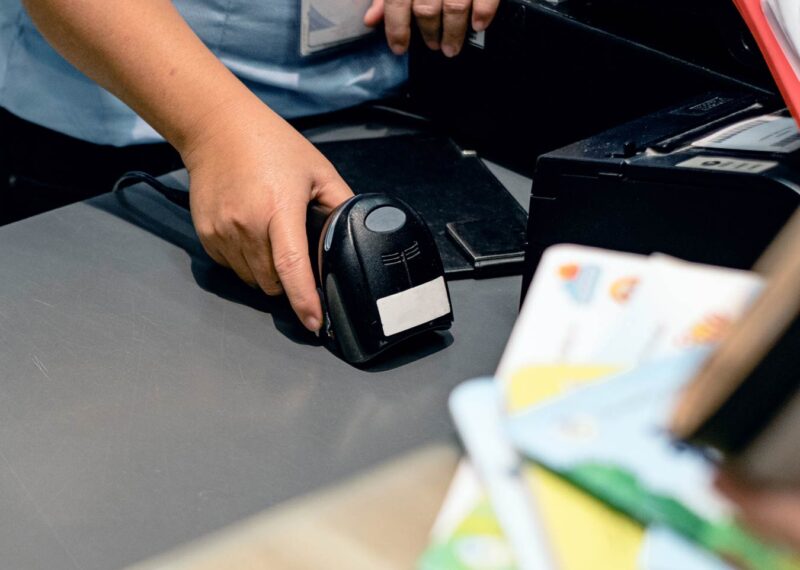 Man holding scanning device