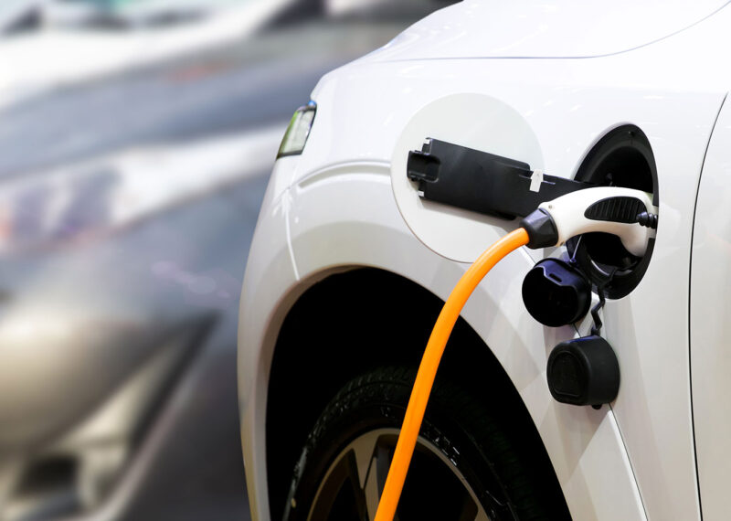 EV car being charged, energy transformation,