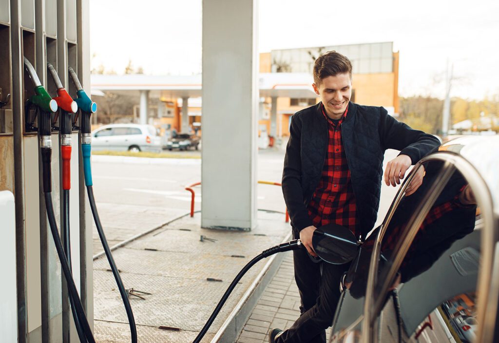 Images of woman reading product ingredients at CPG store and man holding tablet and using computer.