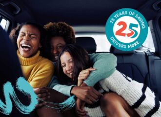 Group of women laughing together in a car, celebrating GasBuddy's 25th anniversary with GasBuddy Rewards and new savings opportunities