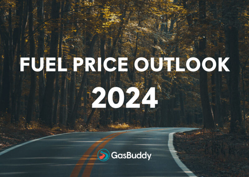View of two lane road through forest, GasBuddy Fuel Price Outlook 2024