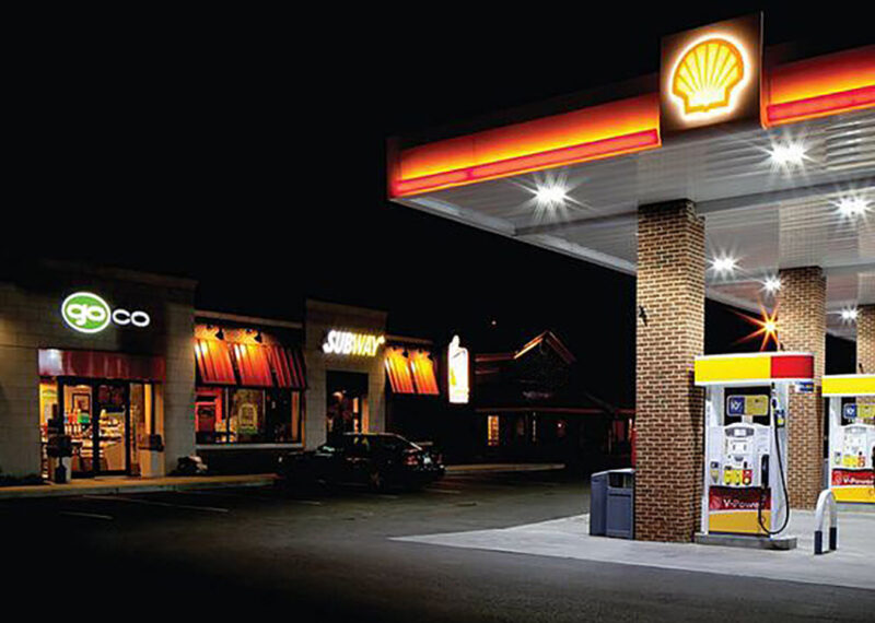 Exterior shot of Gilligan Oil Company store at night