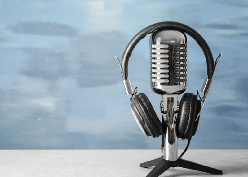 podcast microphone with set of headphones