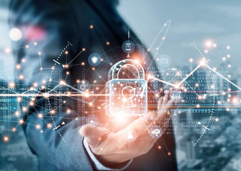 A hand holding a digital image of a lock