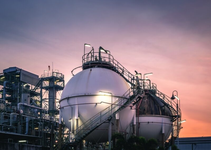 Fuel refinery globes at sunset