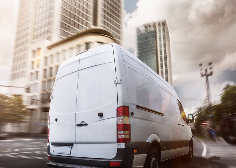 White van in city making a last mile delivery