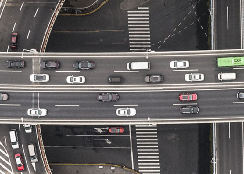 Aerial view of cars driving on multi-level freeway