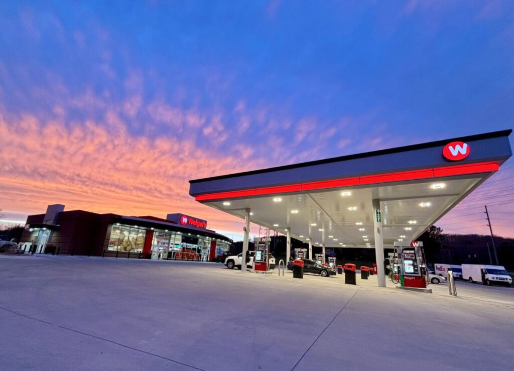 Weigel’s modern convenience store and gas station at sunset, symbolizing personalized retail experiences made possible by PDI Experience Designer