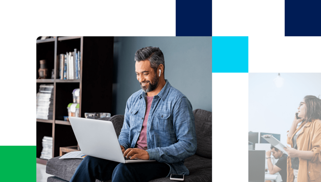 Man sitting at computer smiling and wearing headphones while on a call